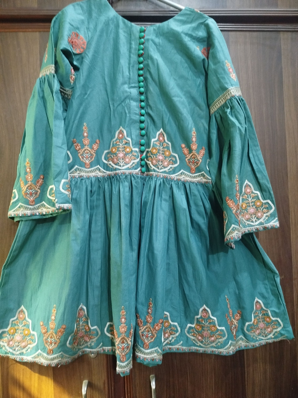Embroidered green frock for girls